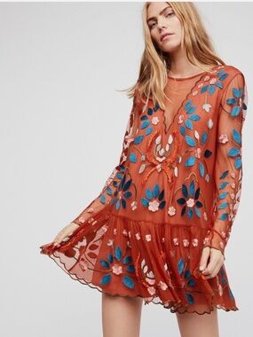 Free People large Hearts are wild embroidered tulle dress in rust color.